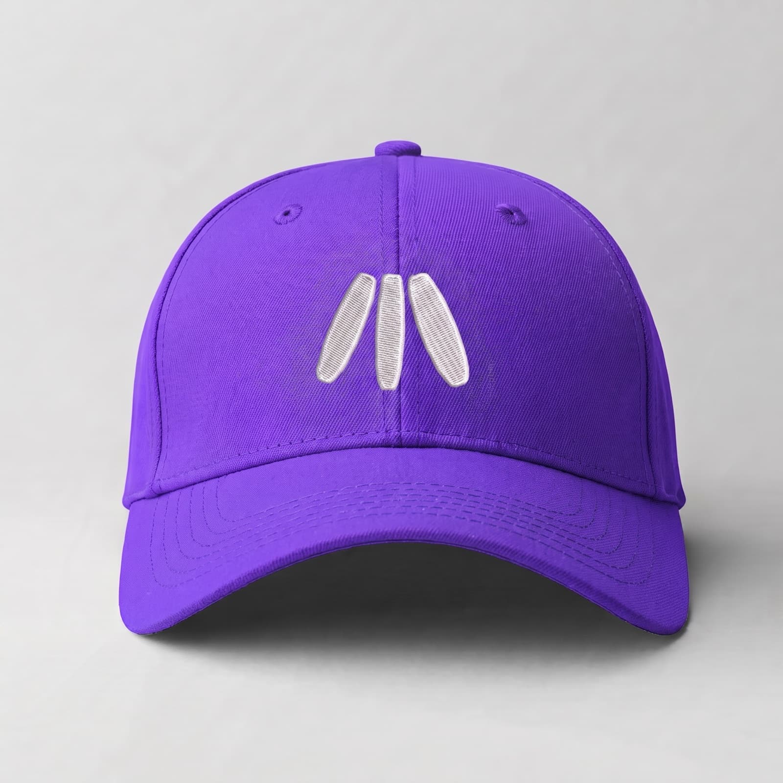 Purple cap with the white Minisend mark embroidered on the front